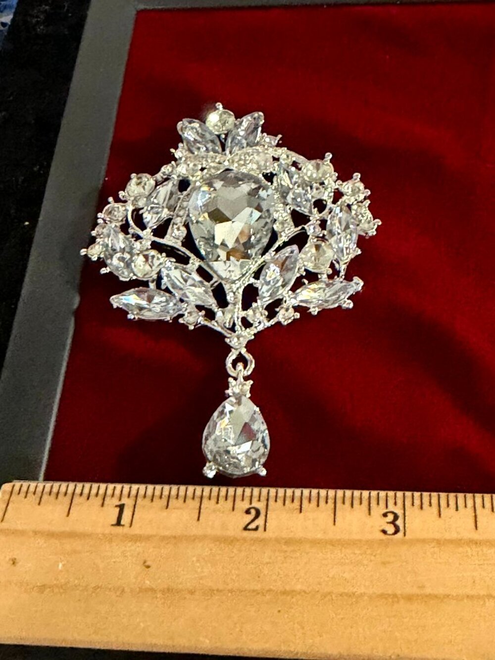 Silver-Tone Rhinestone Floral Brooch with Teardrop Dangle